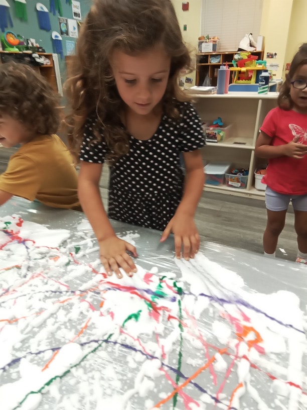 Kids doing crafts and art projects at Sunshine Prep Academy